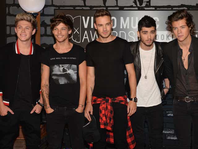 Boy band One Direction have been named top Global Recording Artist 