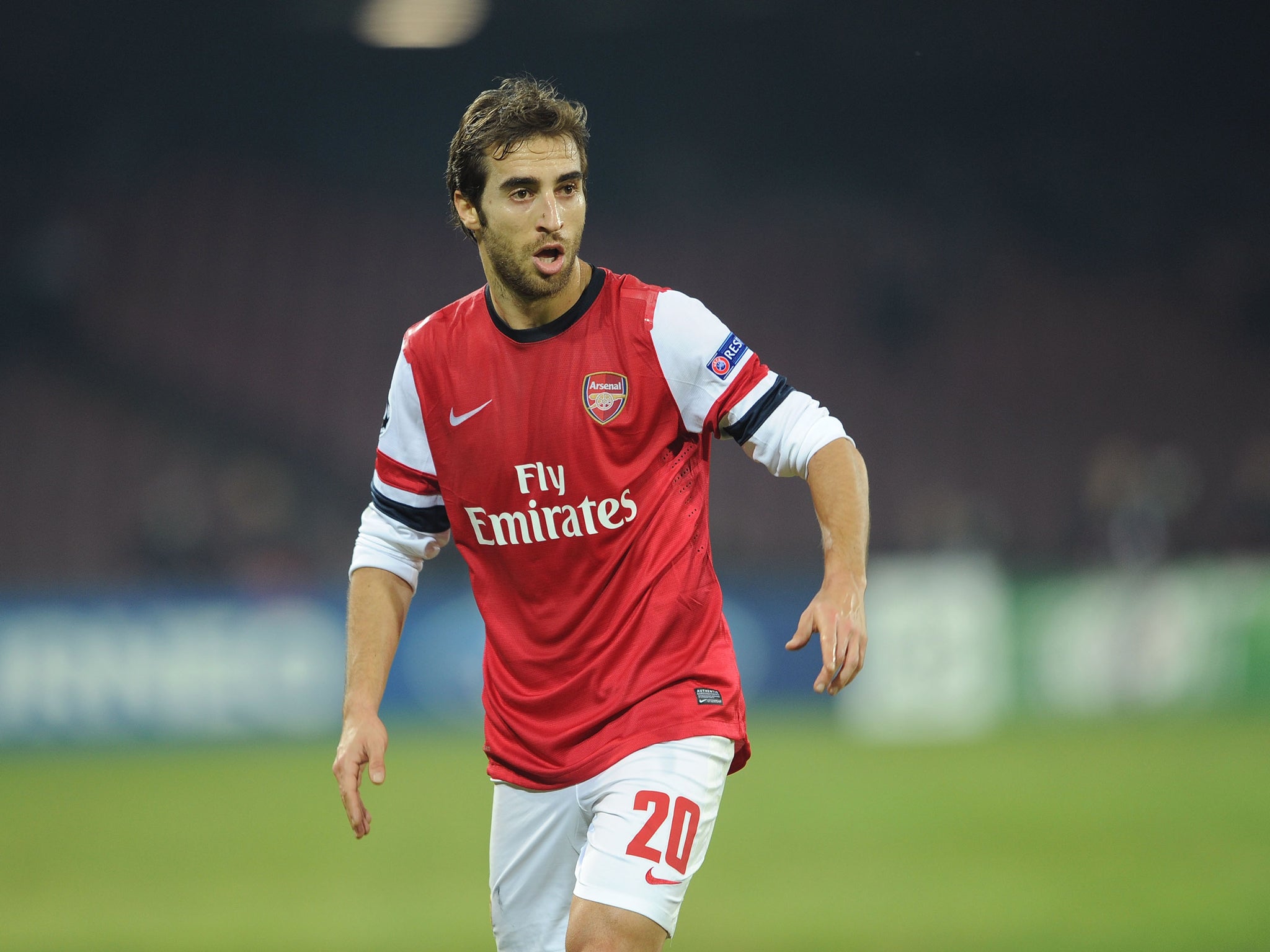 Arsenal midfielder Mathieu Flamini has praised the team for coming through Group F despite missing out on progressing as group winners