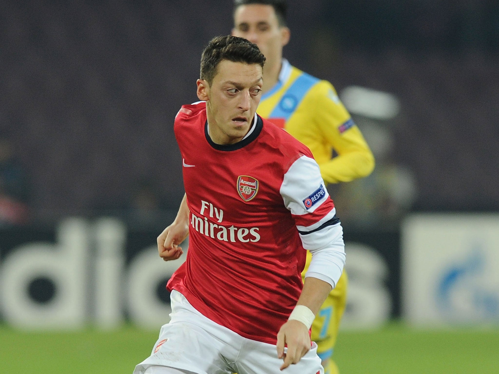 Mesut Ozil turns on the ball during Arsenal's 2-0 defeat against Napoli on Wednesday