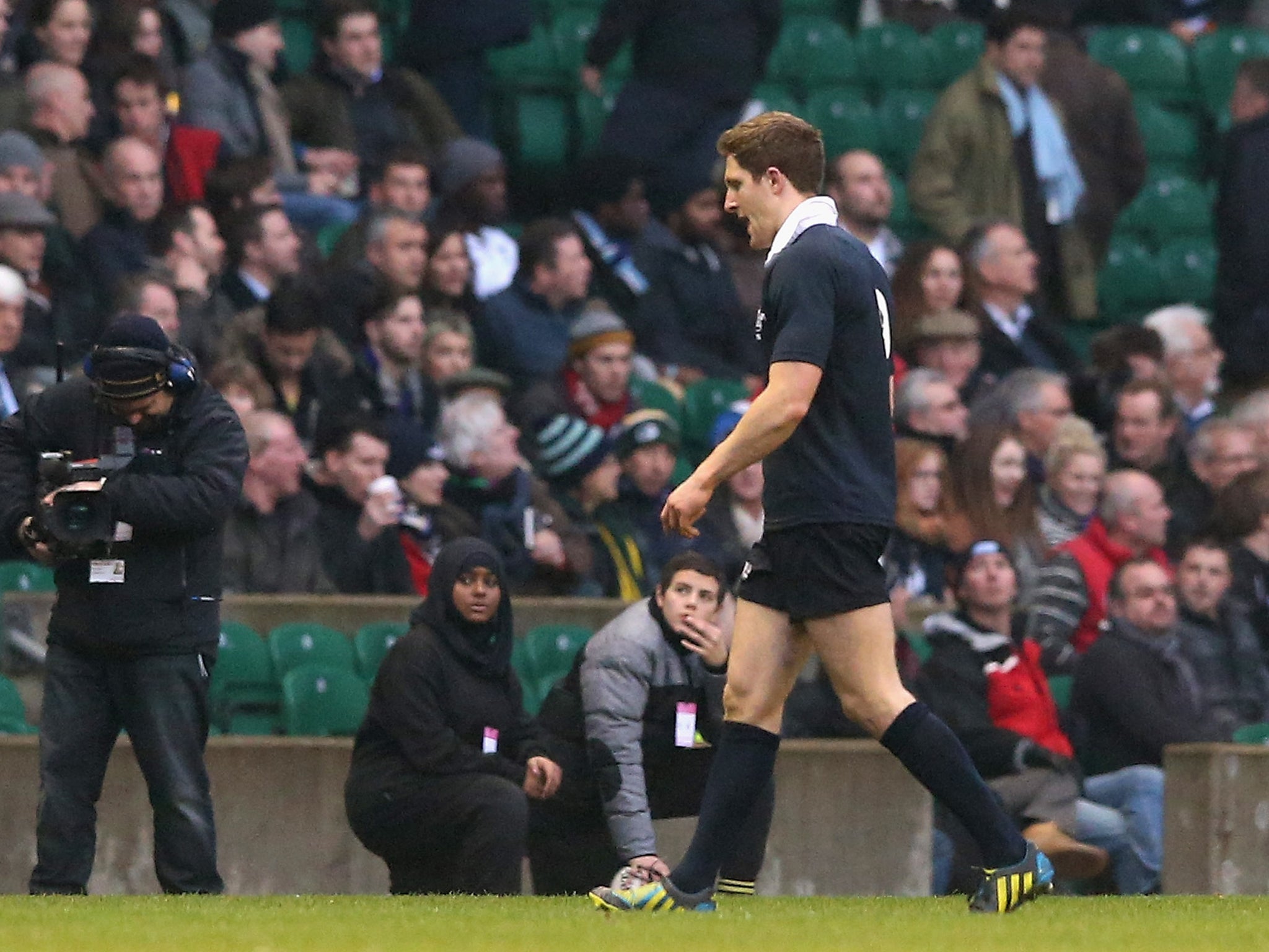 Oxford scrum-half Sam Egerton walks off the Twickenham pitch after becoming the first person to be sent off in the Cambridge v Oxford varsity match