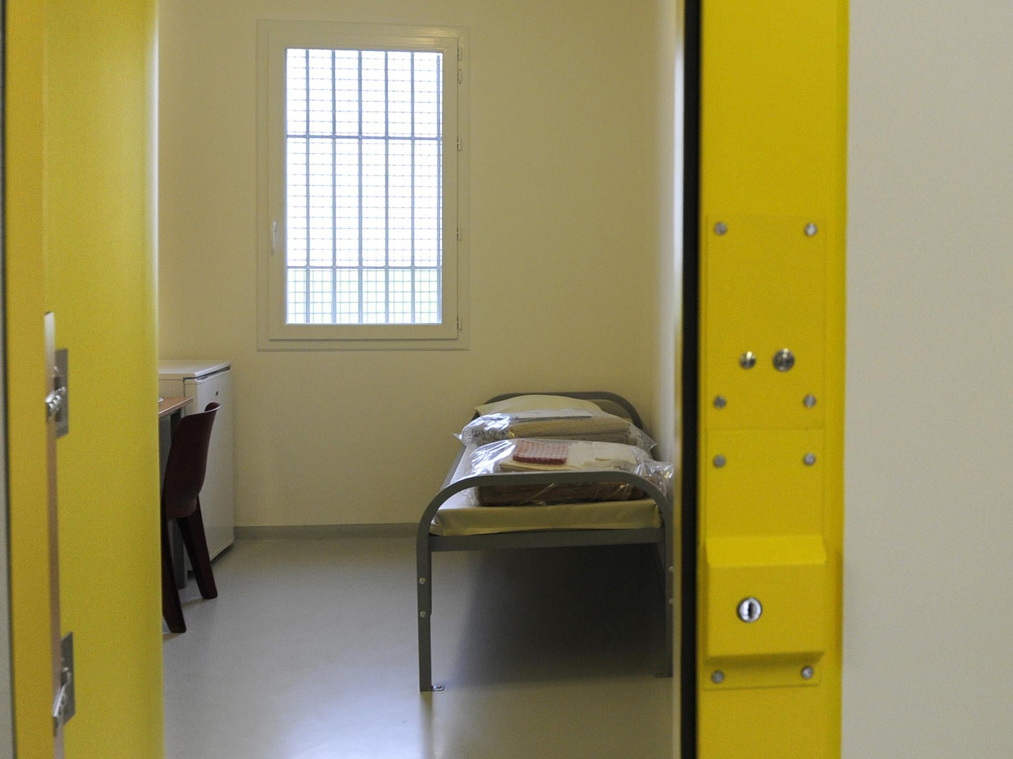 File image showing a prison cell. A woman was made to clean up after herself after having a miscarriage in her cell, it has been alleged.