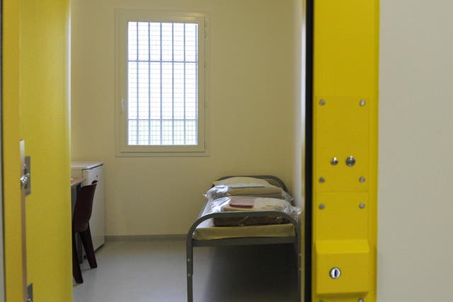 File image showing a prison cell. A woman was made to clean up after herself after having a miscarriage in her cell, it has been alleged.