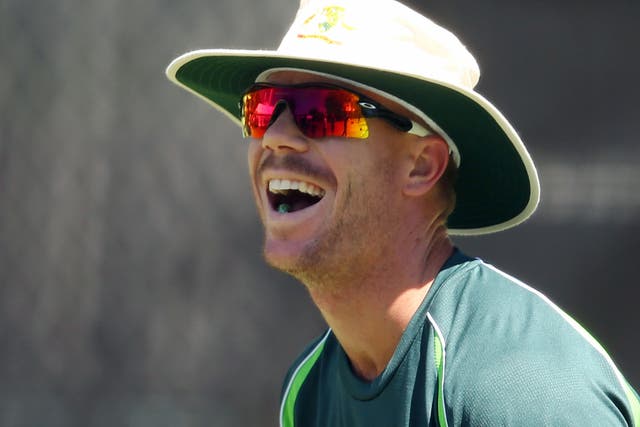 Plenty to laugh about: David Warner of Australia shares a laugh with his team during a nets session in Perth
