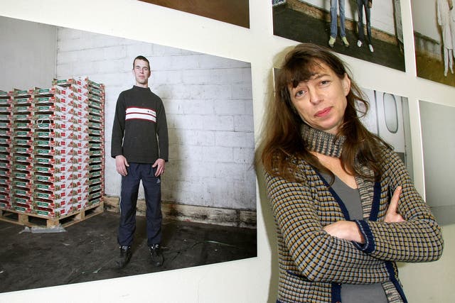Barry in 2009 with pictures she had taken at the Rungis Market in Paris