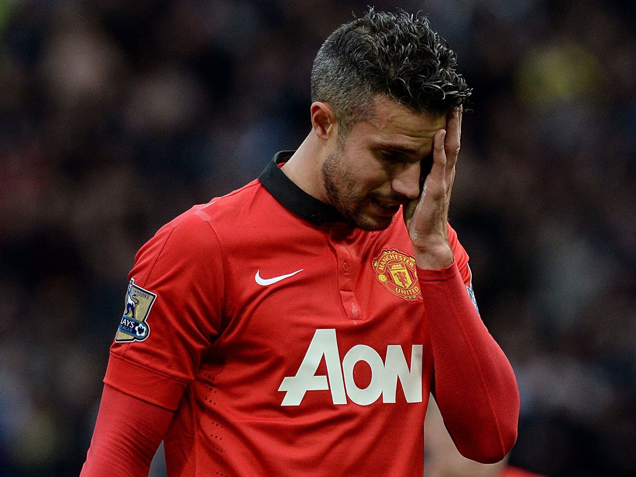 Manchester United striker Robin van Persie has been ruled out for a month with a thigh injury