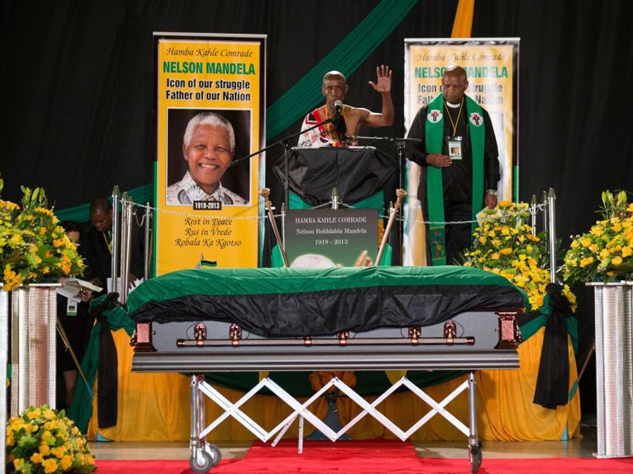A speaker addresses mourners during the ANC ceremony for former South African president Nelson Mandela.