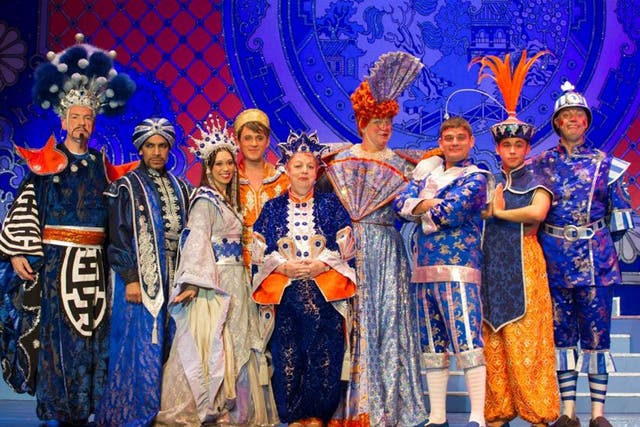 Panto debut: Jo Brand (fourth left) is a genie in Aladdin