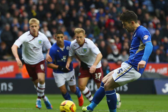 Dave Nugent scores from the spot in the days early kick-off between Leicester and Burnley