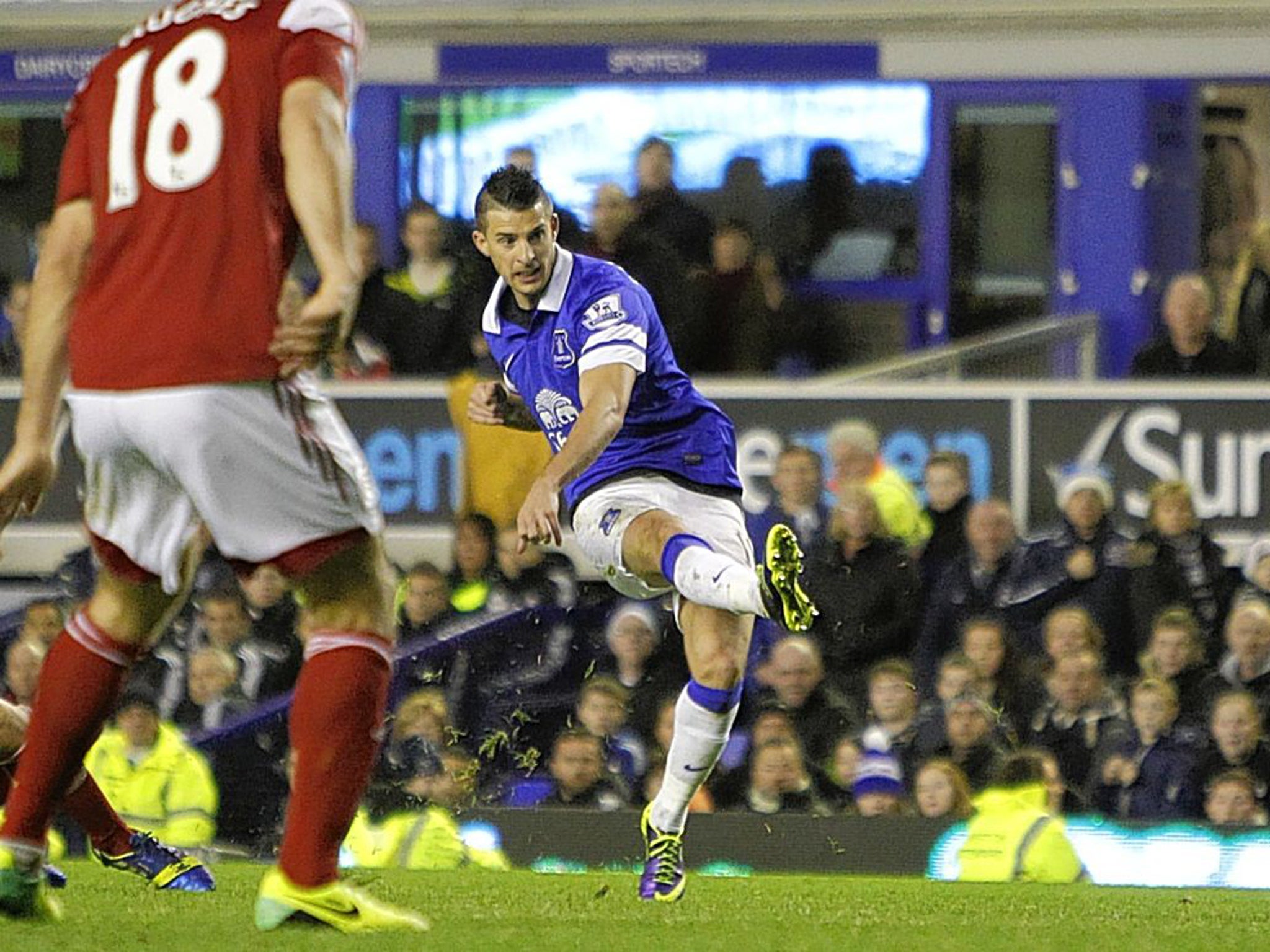 Finishing touch: Kevin Miralles puts the gloss on the result with Everton’s fourth goal in the final minute, against a much-improved Fulham