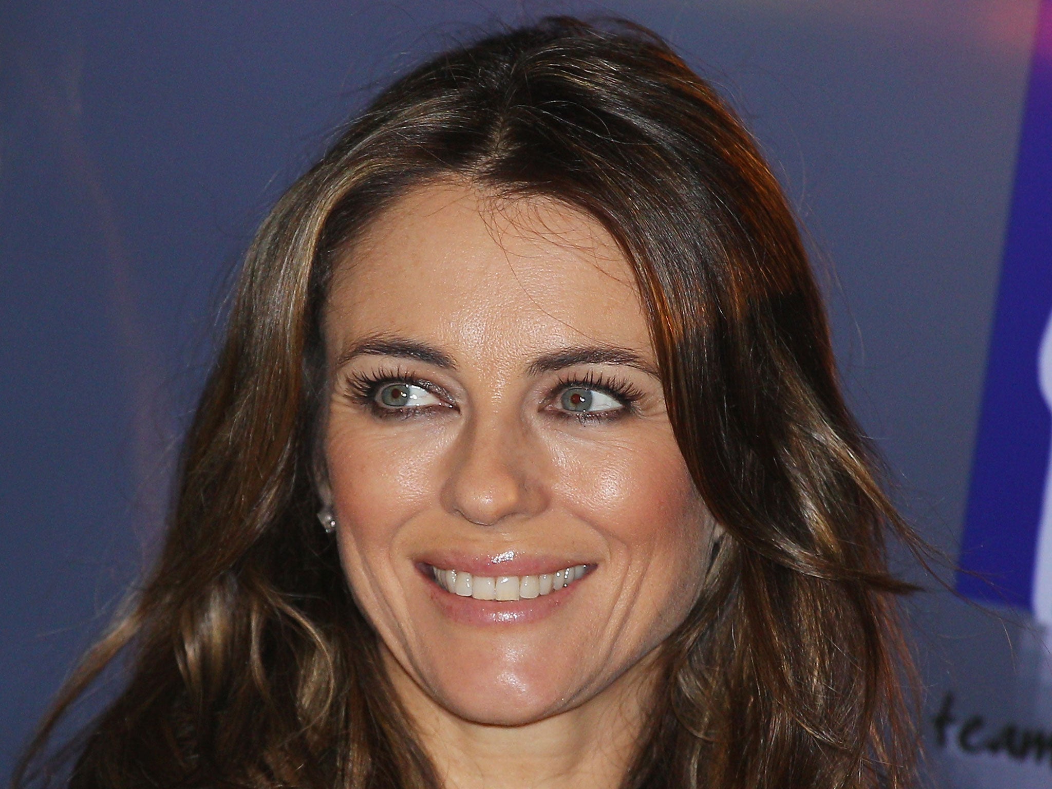 Liz Hurley is selling her shows for charity