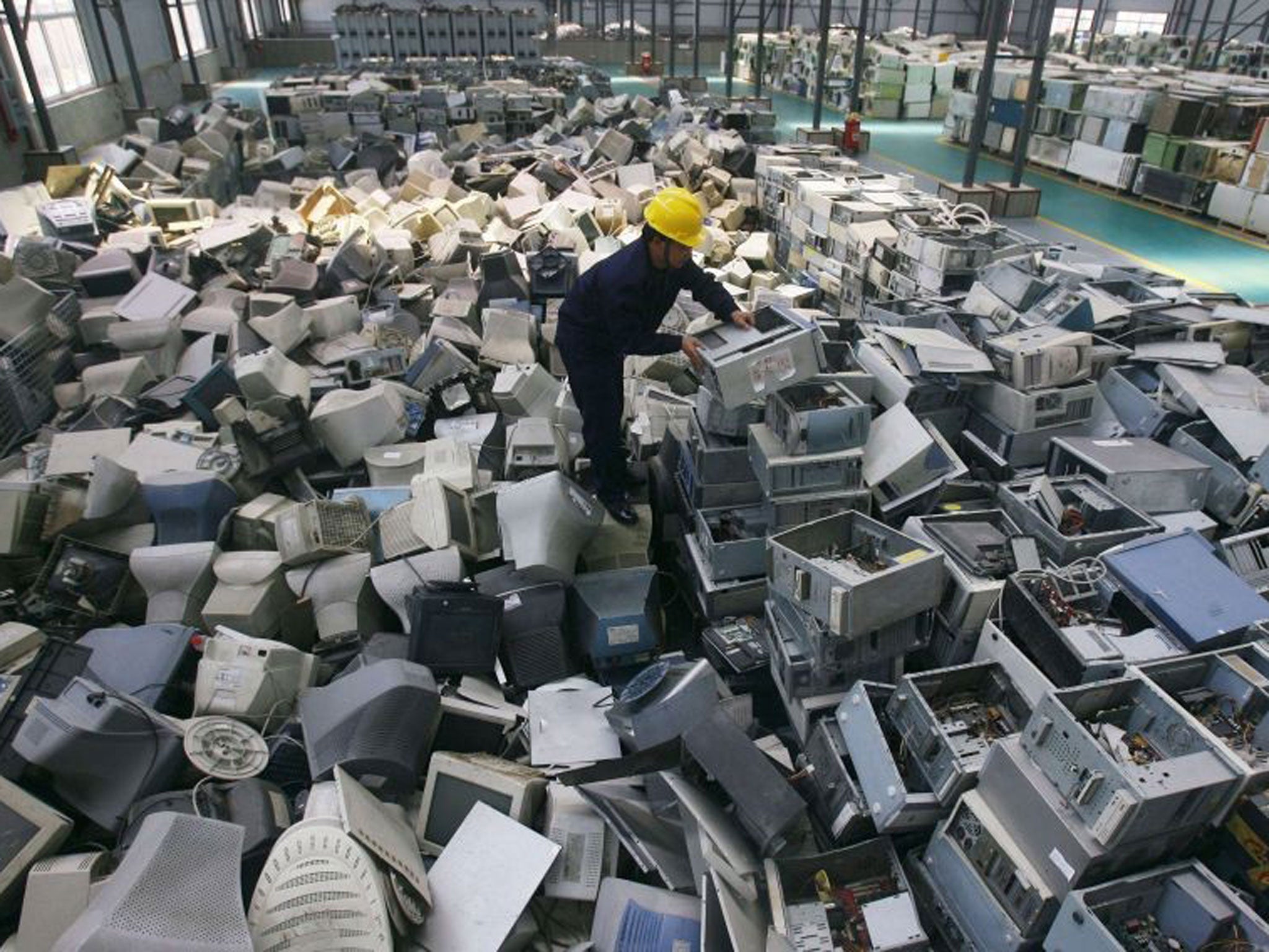 West’s exports: Old computers wait to be recycled in China