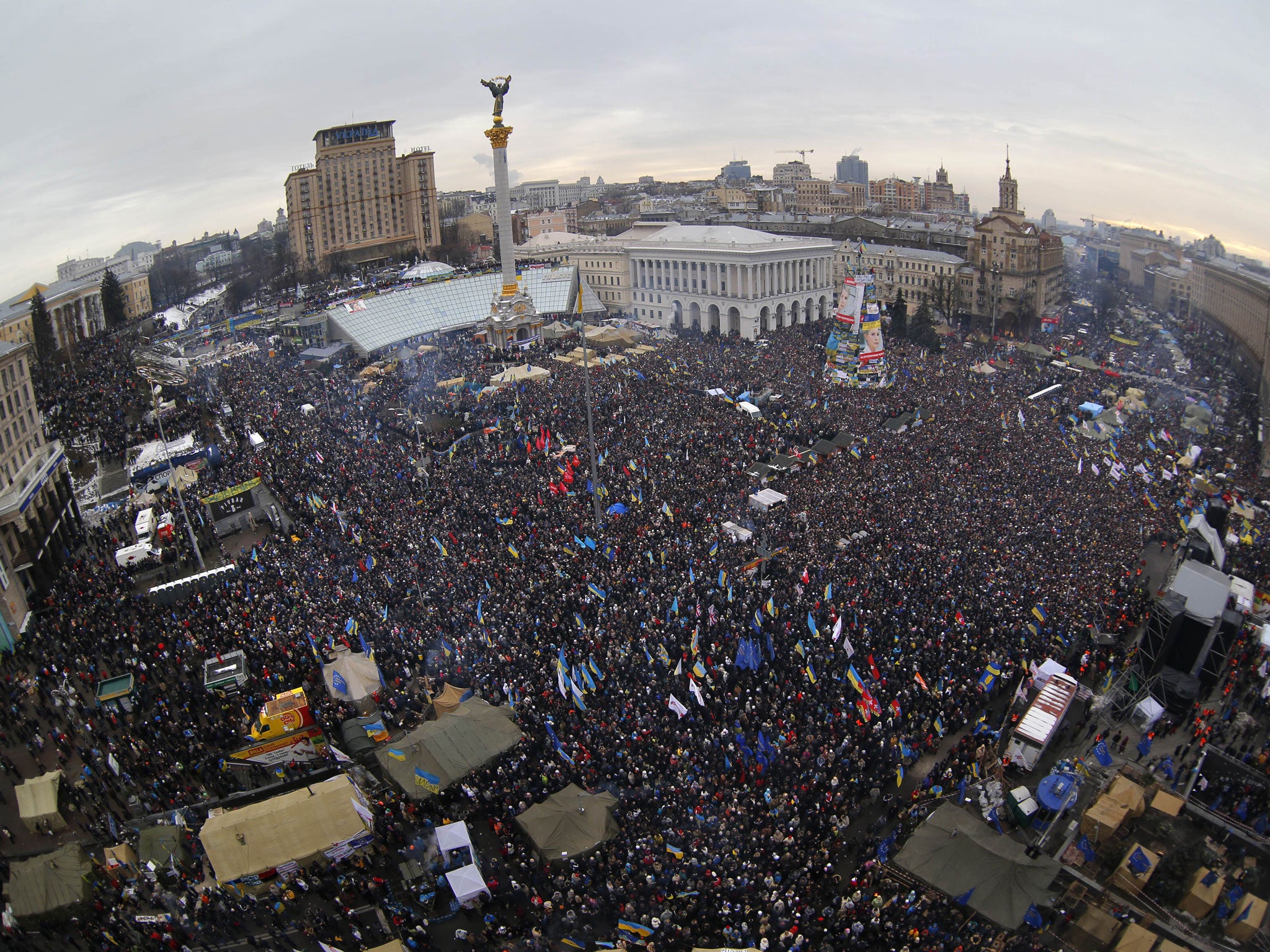 An estimated 200,000 anti-government demonstrators converge on Independence Square in central Kiev