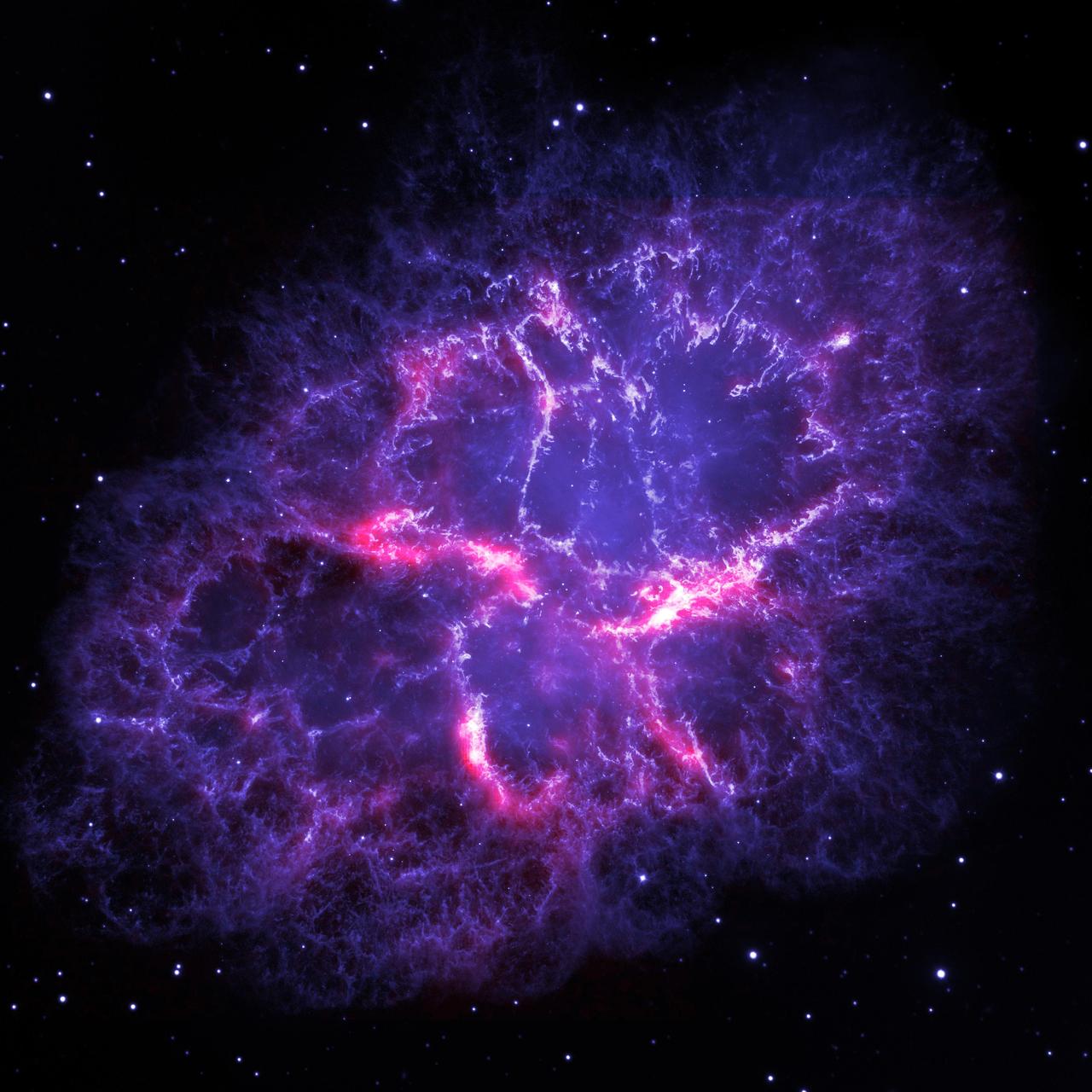 A composite image of the Crab Nebula made up of the Hubble Space Telescope image (blue) and the Herschel PACS image (red), which shows the location of the dusty filaments. The brightest (white) parts of the image show the locations of the dust and argon hydride molecules newly discovered in this remnant.