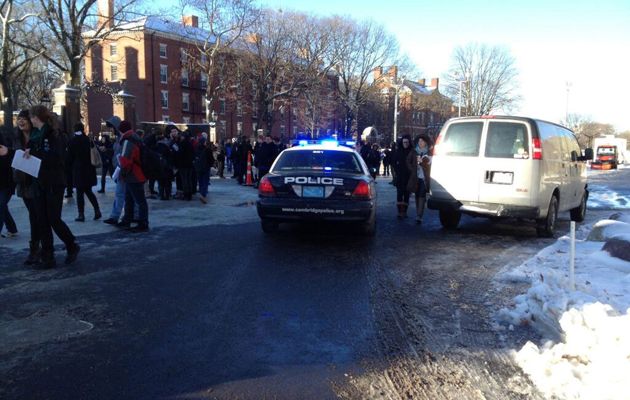 Students and police outside Harvard University's Science Center building, after unconfirmed reports of a bomb threat inside