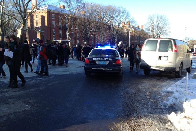 Students and police outside Harvard University's Science Center building, after unconfirmed reports of a bomb threat inside