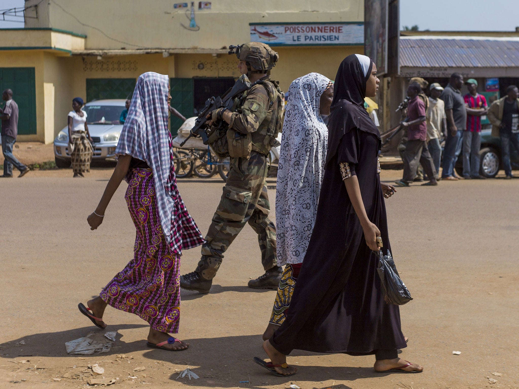 French troops patrol in a street of the Muslim PK-5 district in Bangui