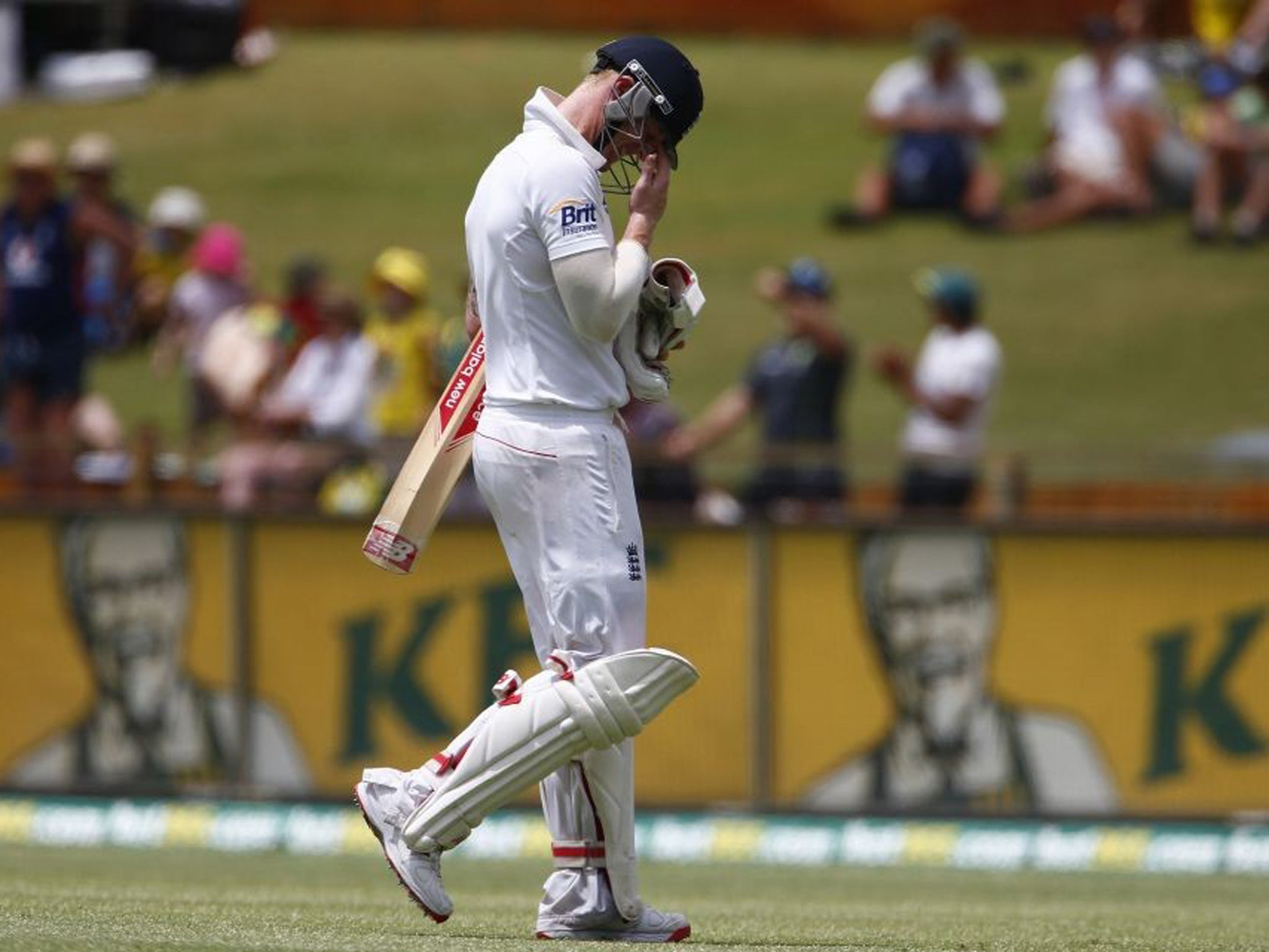 England's Ben Stokes leaves the field after being caught out by Australia's Brad Haddin