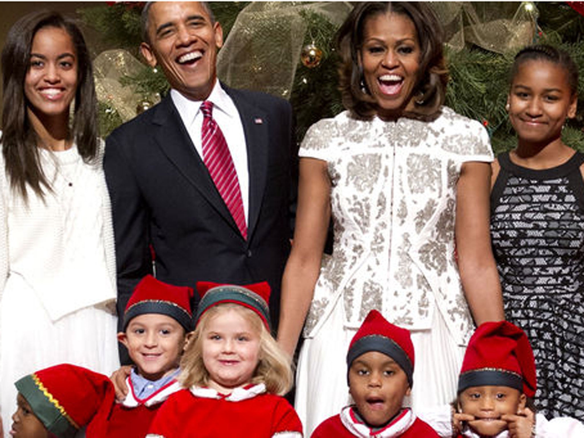 One of the five elves managed to upstage the US president during a Christmas photocall