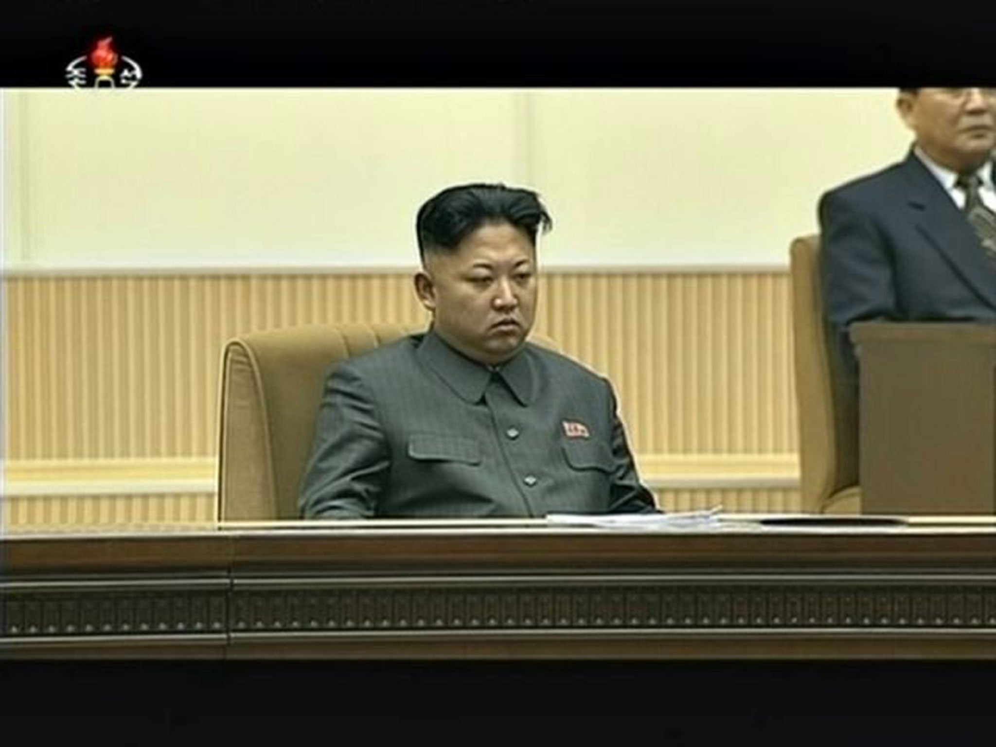 Kim Jong Un attends an event marking the death of his father