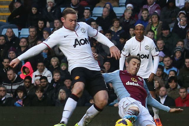 Wayne Rooney shoots for Manchester United in their win over Aston Villa