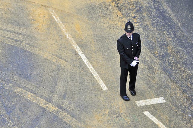 A policeman’s lot: many police officers see the Government’s programme of cuts as inextricable from the criticism they have faced