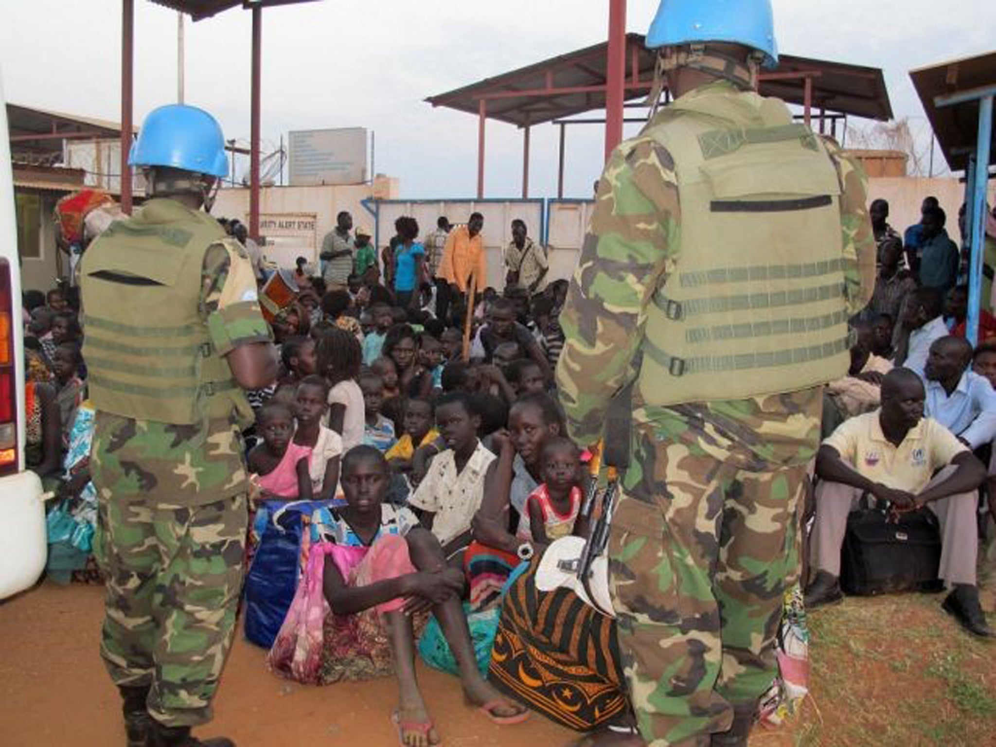 Civilians take shelter at the UN Mission compound on the outskirts of Juba