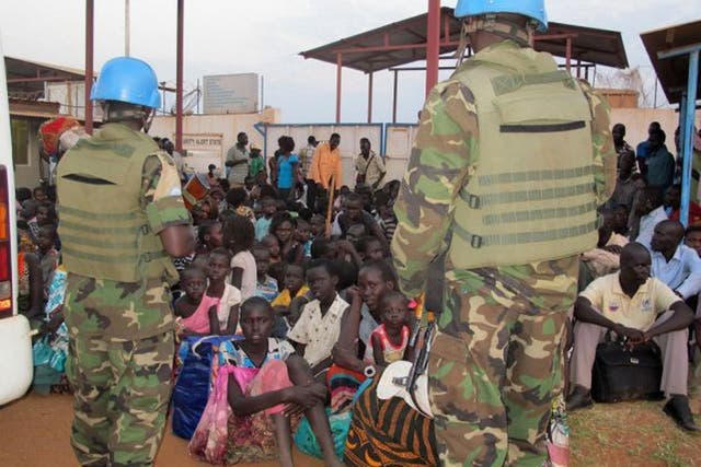 Civilians take shelter at the UN Mission compound on the outskirts of Juba