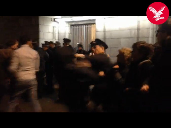 A still from the video allegedly showing a police officer punching a protester