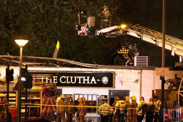 File photo, dated 30 November, at the scene of the helicopter crash at the Clutha Bar in Glasgow