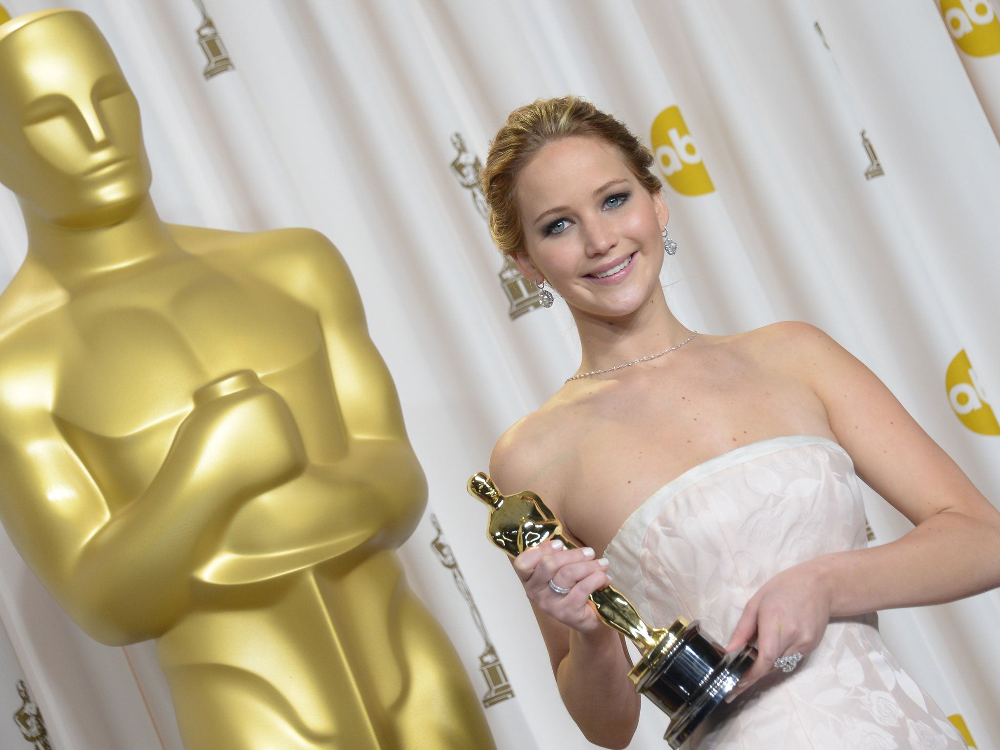 Jennifer Lawrence poses with her award after winning Best Actress for Silver Linings Playbook at the 2013 Oscars
