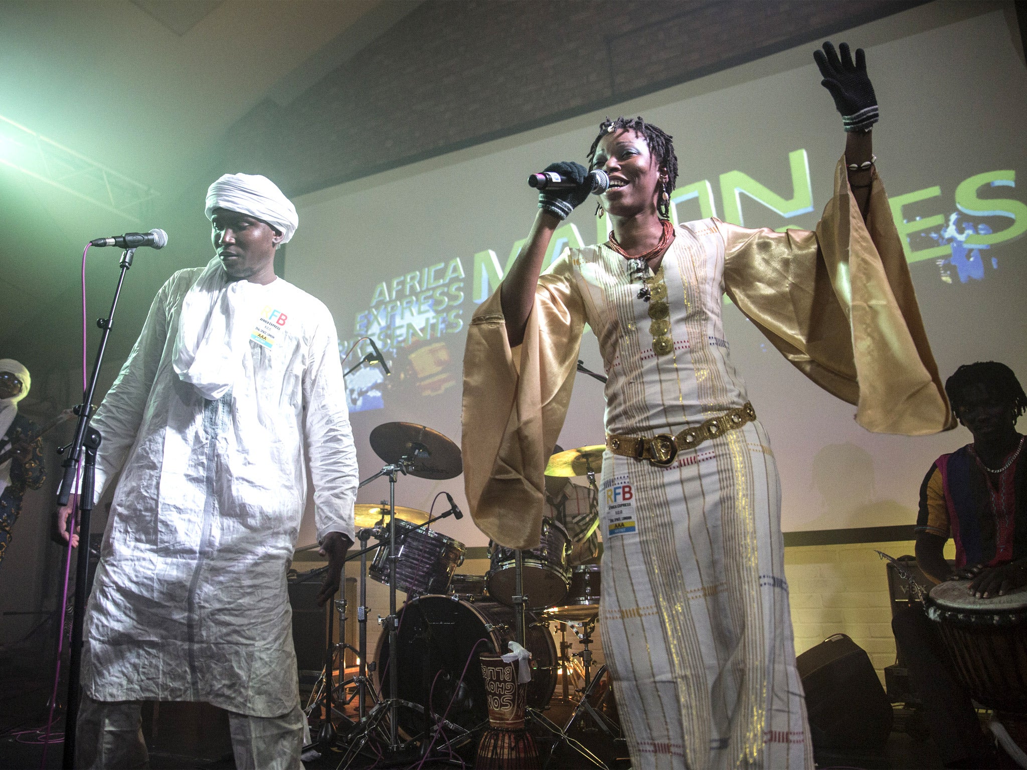Malian artists Aliou Toure and Bijou at their London album launch. To get here they had to fly to Senegal and wait weeks for visas