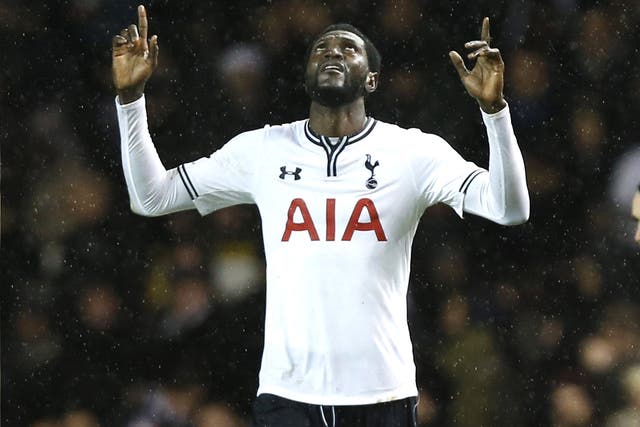 Adebayor thanks the man upstairs - not Daniel Levy in this instance