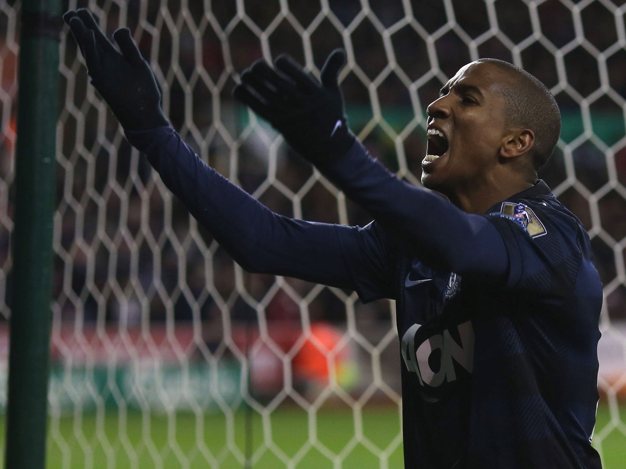 Manchester United winger Ashley Young celebrates after scoring in the League Cup quarter-final win over Stoke City