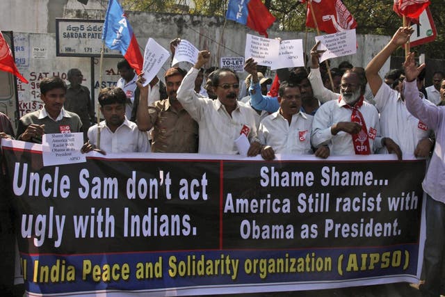 Left party activists shout slogans during a protest against the alleged mistreatment of New York based Indian diplomat Devyani Khobragade, near the US Consulate in Hyderabad