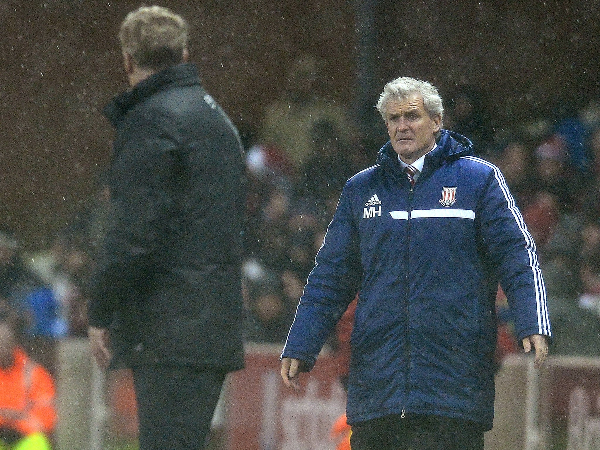 Stoke City managed by Mark Hughes (right) take on Newcastle on Boxing Day