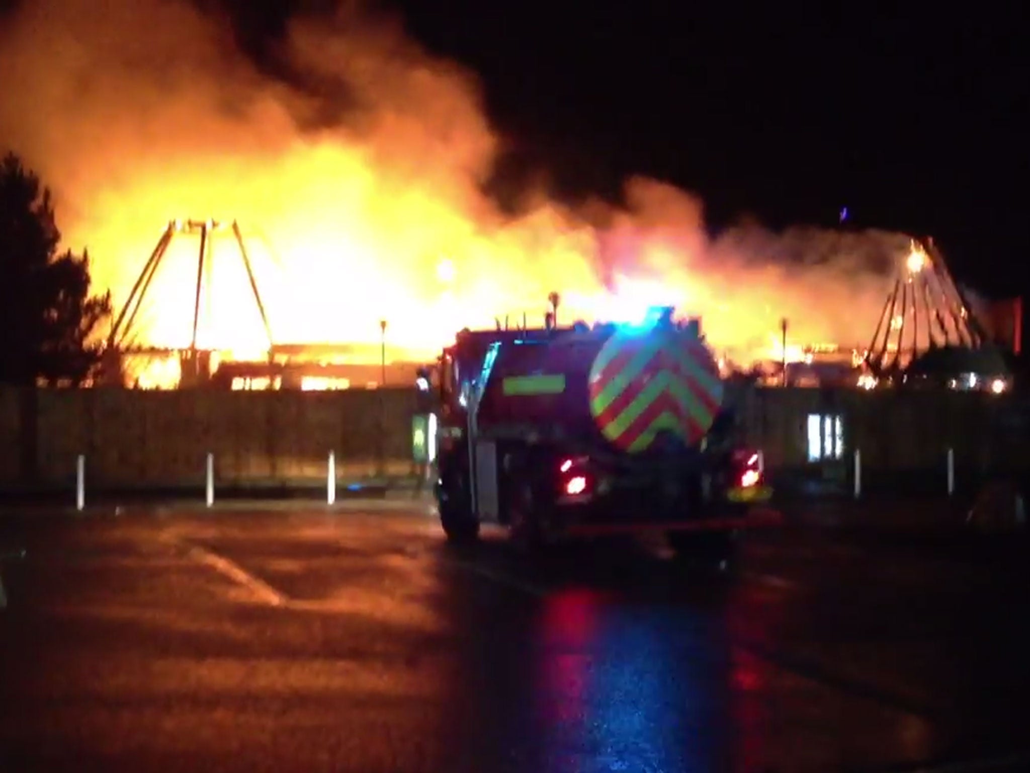 People evacuated from the nearby cinema watched on as fire crews tackled the Red Hot blaze