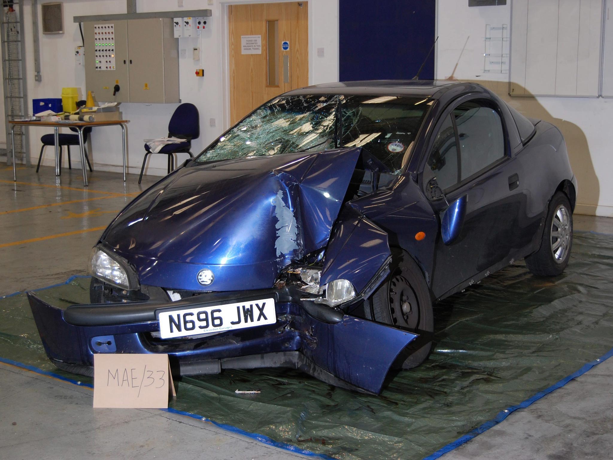 A damaged Vauxhall Tigra shown during the trial against Michael Adebolawe, 22, and Michael Adebolajo, 28