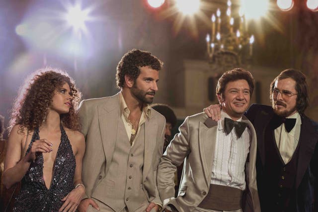 The fake team: Amy Adams, Bradley Cooper, Jeremy Renner and Christian Bale in American Hustle