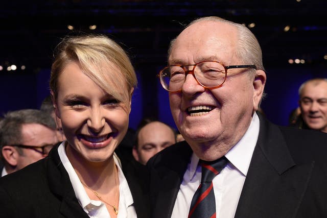 Jean-Marie Le Pen with FN deputy Marion Marechal-Le Pen in November of this year - the former leader of the FN has suggested Romanians are 'naturally' inclined to stealing