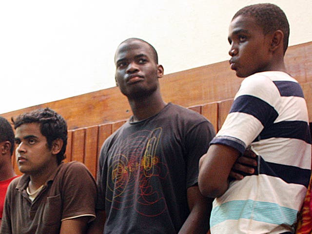 Michael Adebolajo (C), in 2010, among the nine suspected members of the Al-Shabaab Movement