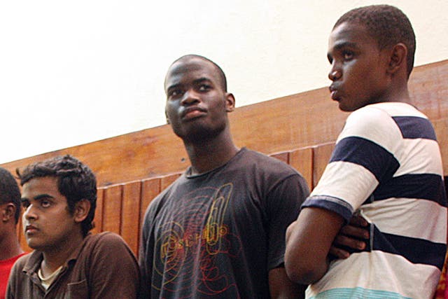 Michael Adebolajo (C), in 2010, among the nine suspected members of the Al-Shabaab Movement