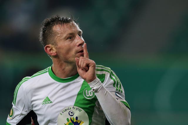 Ivica Olic of Wolfsburg celebrates his teams second goal