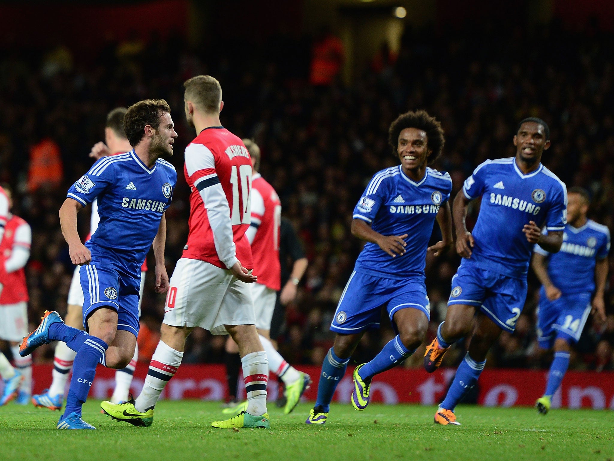 Juan Mata celebrates scoring in the League Cup fourth round against Arsenal