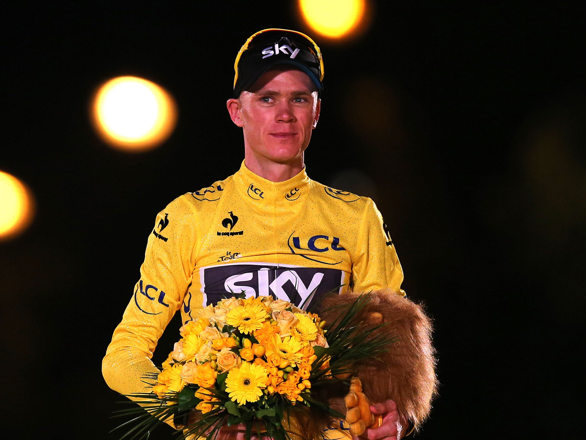 Chris Froome on the podium after the final stage of the Tour de France this summer (Getty)