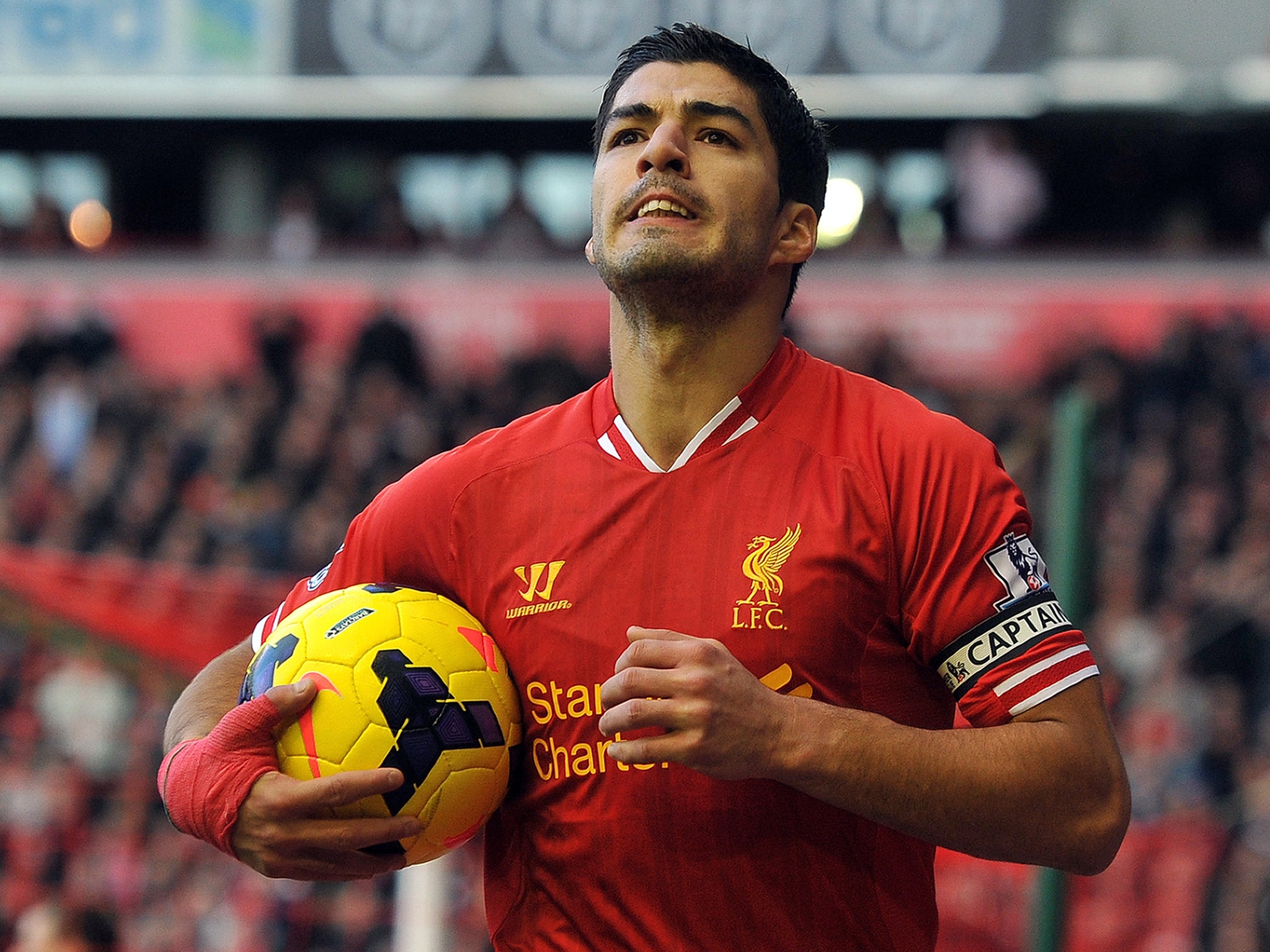 Luis Suarez bags brace against Liverpool to win title with his