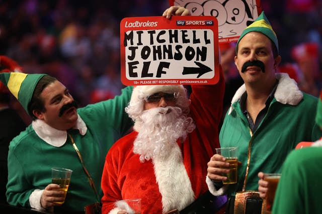 Fans at the World Darts Championship keep themselves entertained with the various fancy dress seen each night