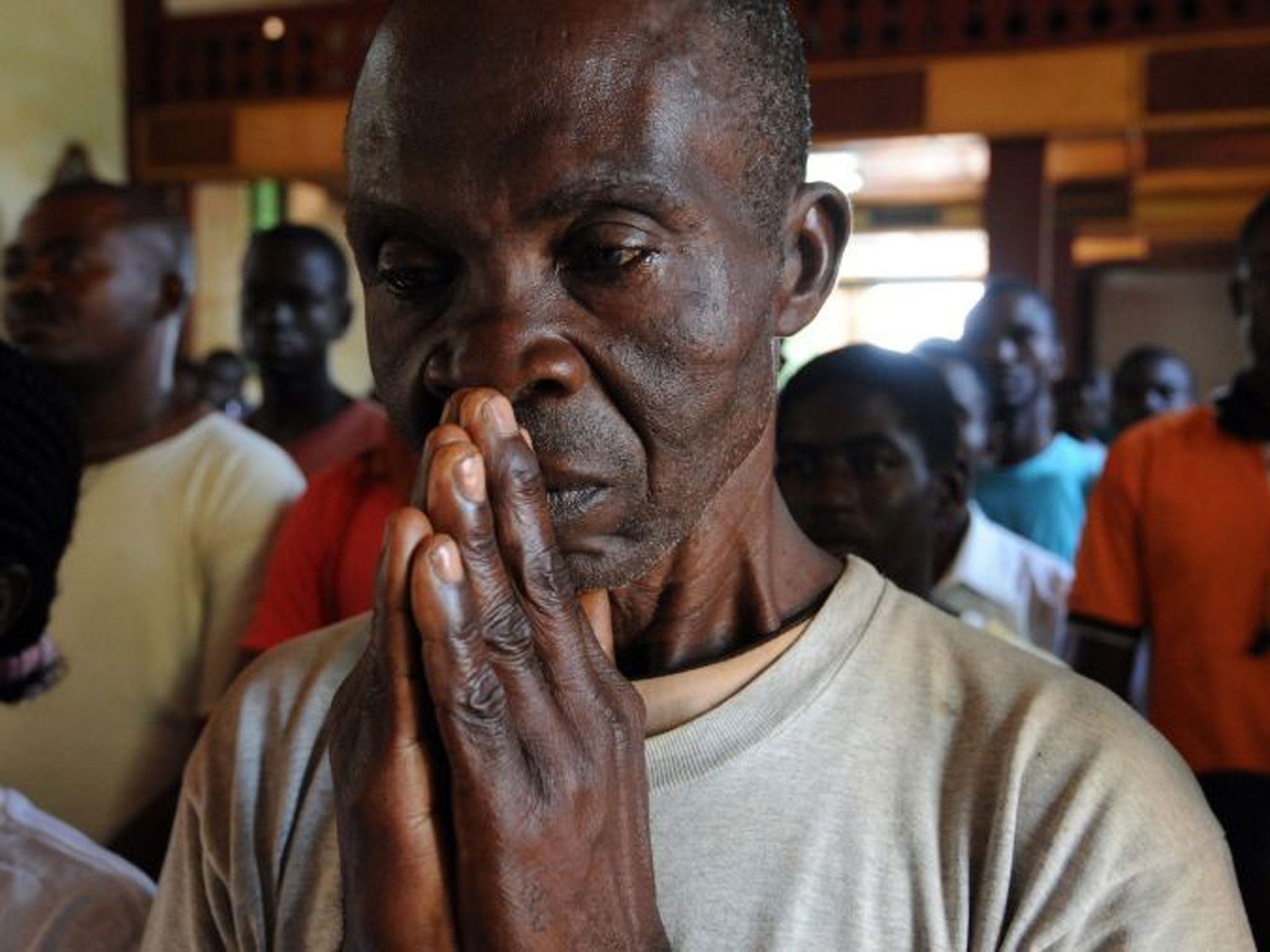 A man prays in the CAR; 600 have died since fighting started