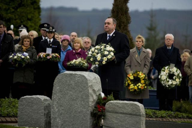 Scotland’s First Minister, Alex Salmond, lays a wreath at Dryfesdale Cemetery, near Lockerbie