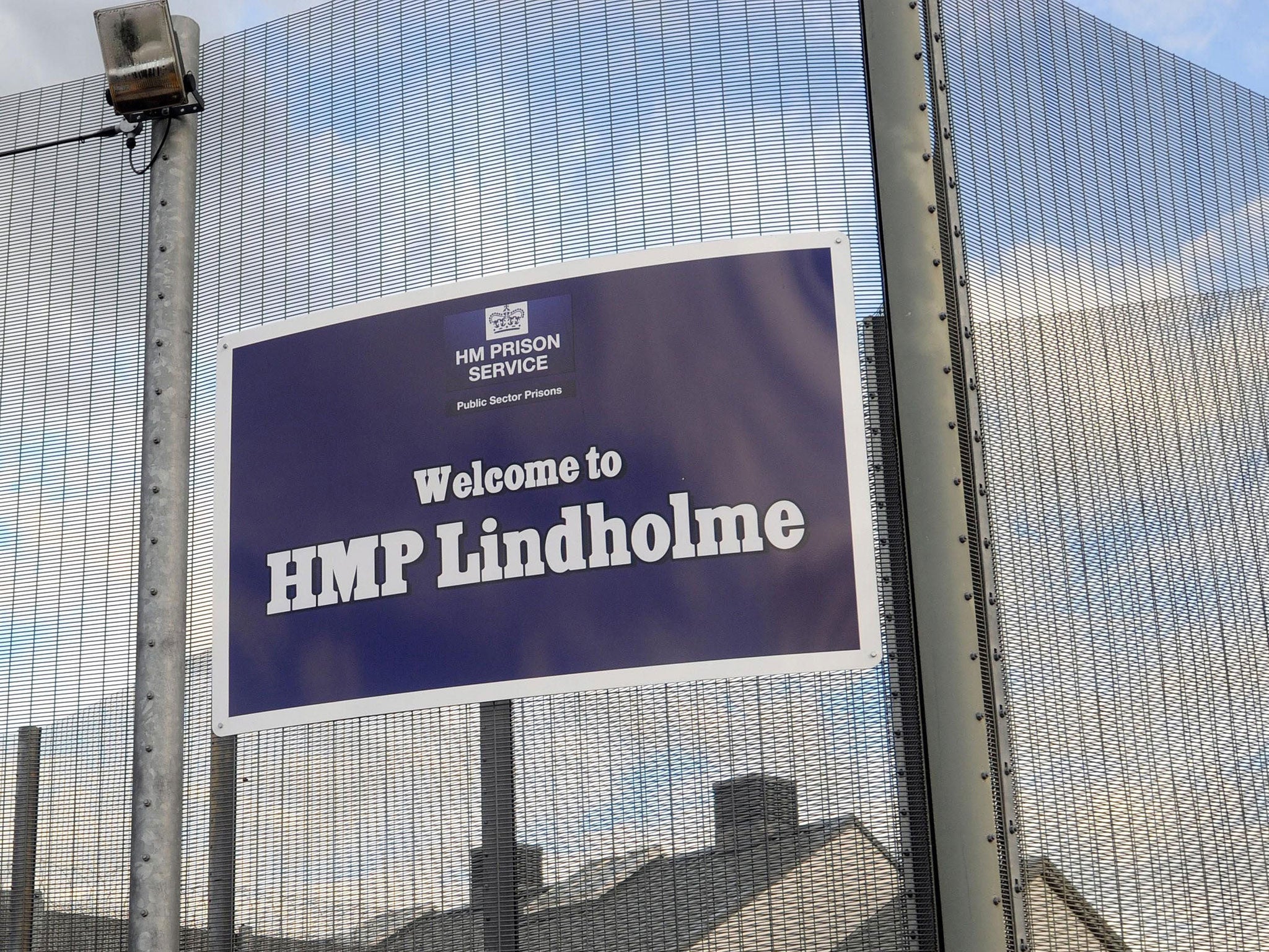 A prison officer was strangled until he fell unconscious on Thursday