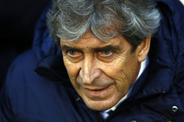 Manchester City manager Manuel Pellegrini looks on from the touchline